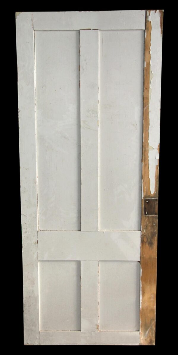 White four-panel wood passage door shown upright, with visible edge wear and no hardware included.