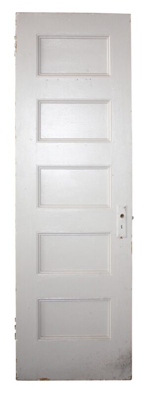 White wood passage door with five horizontal panels and a visible hardware cutout on one side.