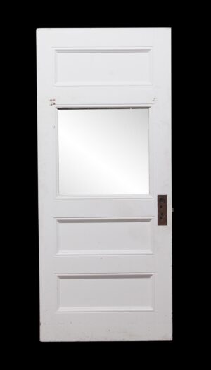 White wooden passage door with three horizontal panels, a large center glass panel, and a metal latch plate on the right side.