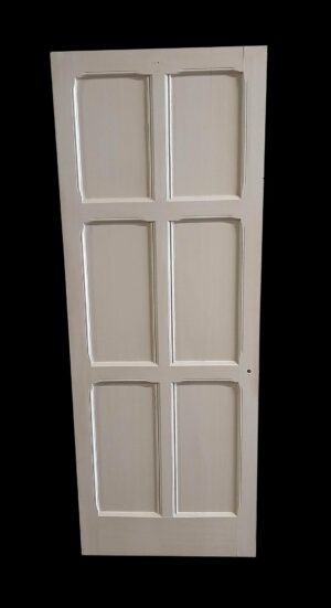 Six-panel Arts & Crafts door in white painted oak, shown upright with one latch hole visible.