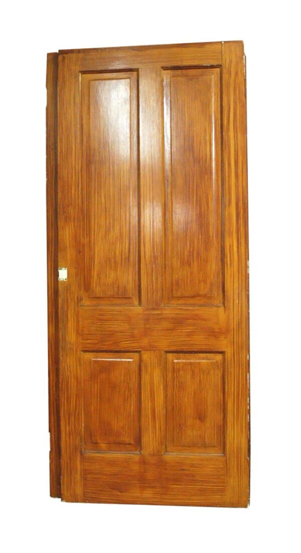 Wood passage door with four panels shown in a medium wood tone finish.