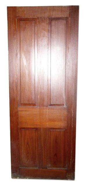 Vertical vintage wooden passage door with four raised panels in a dark wood tone.