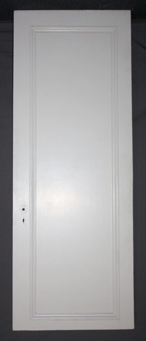White wood passage door with one raised panel and a centered keyhole on the left side.