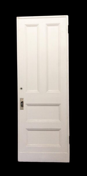White wooden four-panel door with two tall upper panels and two wider lower panels, shown with the latch cutout visible on the left side.