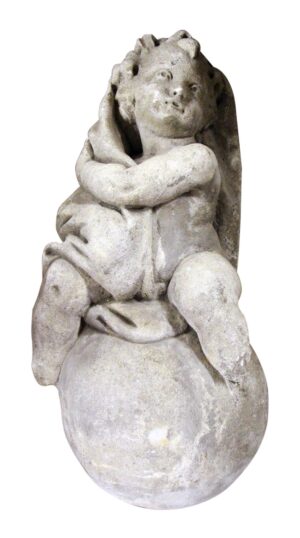 Gray limestone cherub finial seated on a pedestal, shown front view with crossed arms and worn carved details, missing the feet.