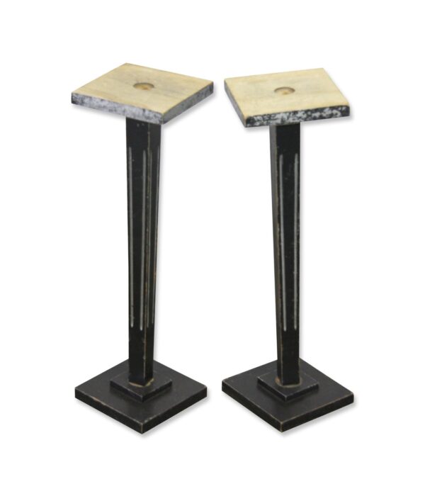 Pair of Art Deco square wooden table bases with black pedestal stands and square tops, shown side by side.