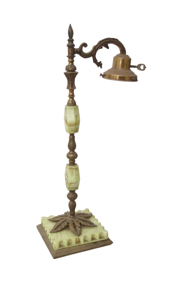 Victorian table lamp with an antique brass post, green marble accents, and a single adjustable shade arm.