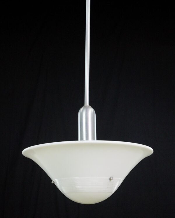 Mid-century pendant light with a white milk glass dish shade and a steel pole.