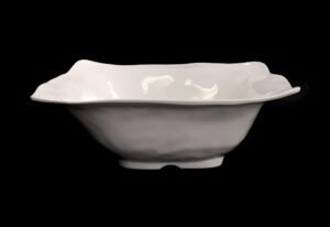 White square serving bowl with a ruffled rim and wide flared shape.