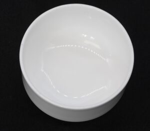 White bone china soup bowl shown from above with a smooth rounded rim and glossy surface.
