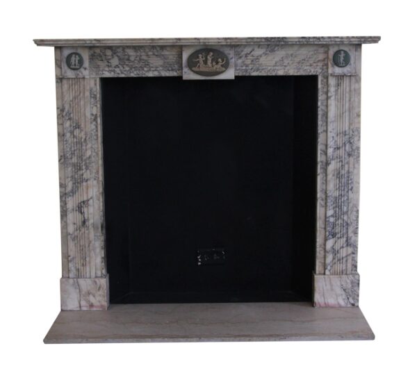 Marble mantel with gray veining, a central oval cameo of three cherubs, and round cameo medallions at the top corners.