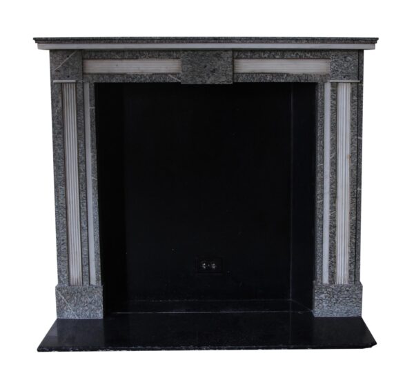 Gray and white marble mantel with a narrow shelf, fluted side inlays, and a large central opening.
