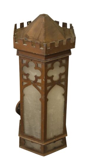 Gothic bronze wall lantern with pebbled glass panels and a square top with upward-pointing edges.
