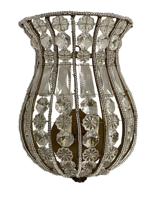 Clear crystal basket wall sconce with a gilt ribbed frame and alternating cut crystal trim, shown front view.