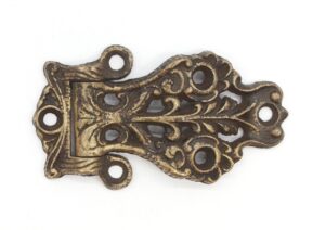 Victorian bronze offset hinge with ornate scrollwork and multiple screw holes, shown from above.