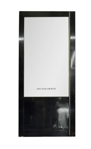 Black metal commercial door with one glass panel, full-length pull bar, and a lower solid panel, shown front view.