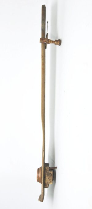 Antique brass commercial door pull shown in side view with long vertical handle and mounting hardware.