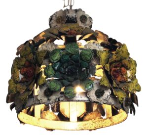 Interior metal floral light with layered painted flower appliqués in multiple colors and a ring-shaped frame, shown from below on a white background.