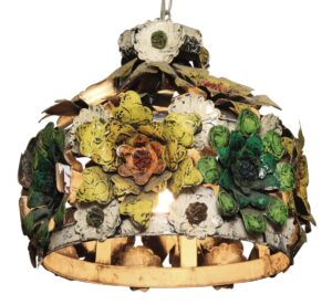 Decorative metal floral light with layered painted blossoms in multiple colors and a rounded cage shape.