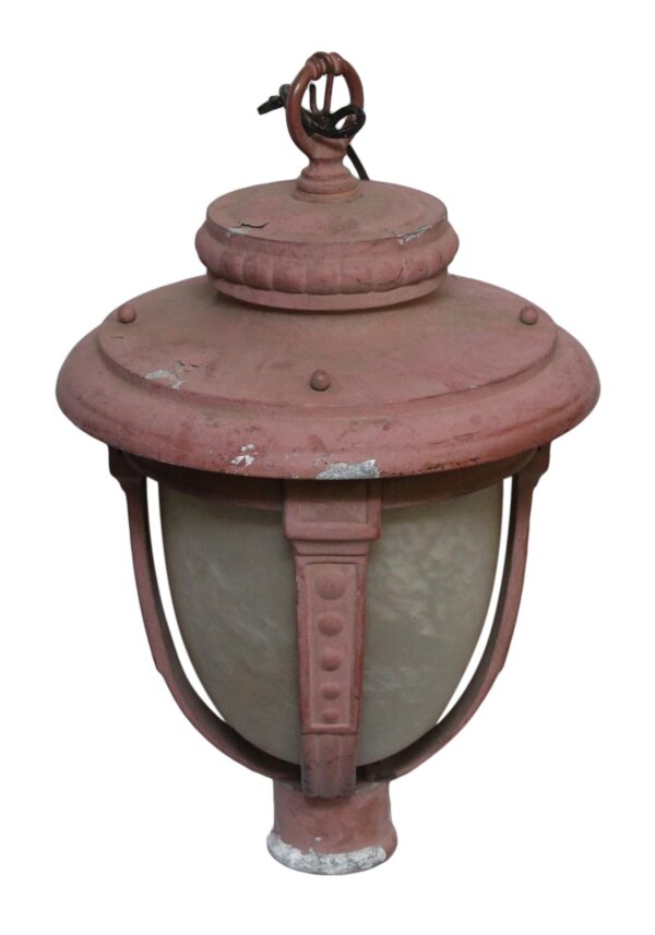 Traditional red exterior lamp post light with a domed top, cast iron frame, and textured glass panels shown in a front view.