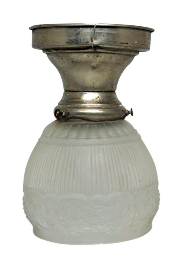 Flush mount light with a white cast glass globe and polished nickel steel canopy, shown in a front view with visible mounting hardware.