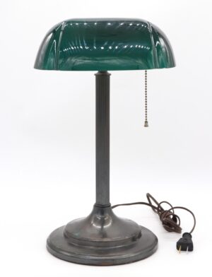 Antique bankers desk lamp with a green-and-white Emeralite shade, fluted column, pull chain switch, and corded plug.