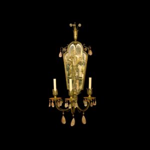 Victorian mirrored wall sconce with three candle lights and crystal drops.