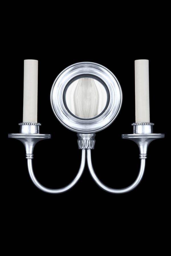 Colonial nickel wall sconce with a convex bullseye mirror and two candle-style lights.