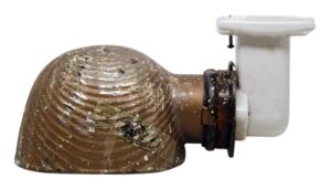 Industrial display light with a brown mercury glass shade and white porcelain base, shown in side view.