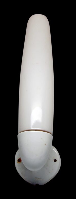 Tall milk glass wall sconce with a white porcelain base and rounded mounting screws.