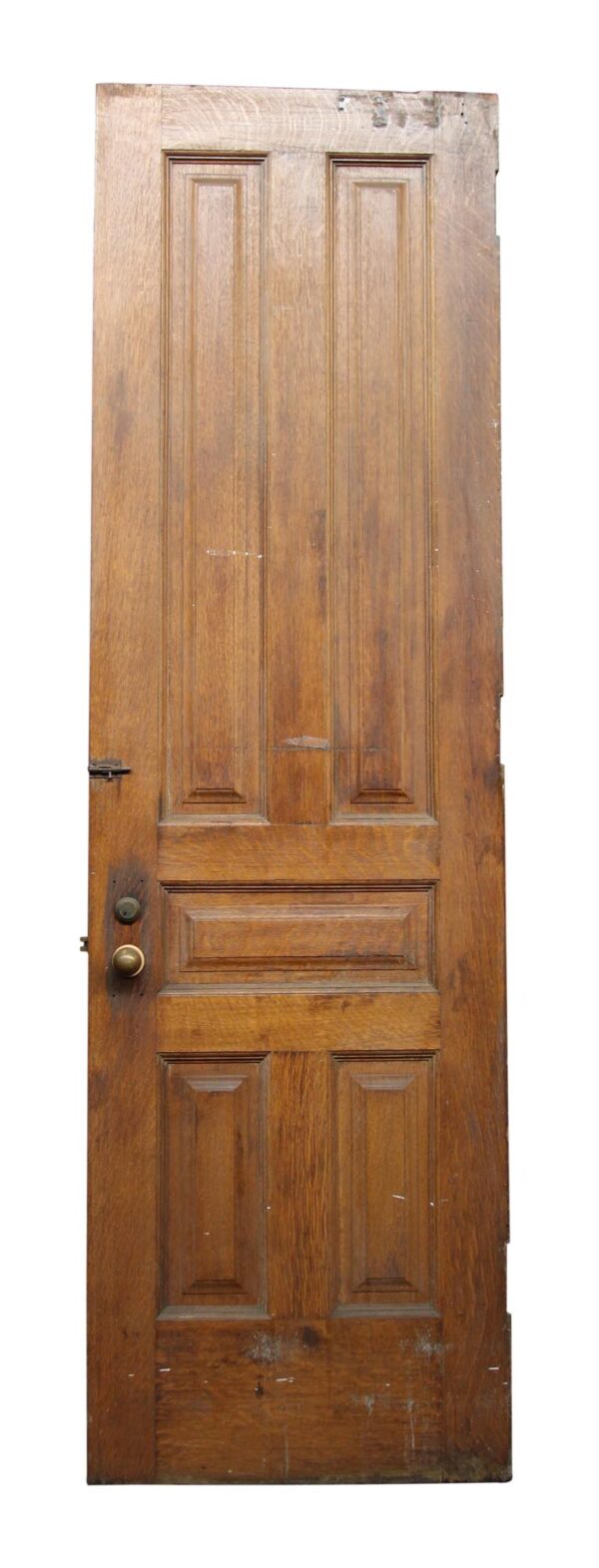 Wood door with five beveled panels and a round knob on the left side.
