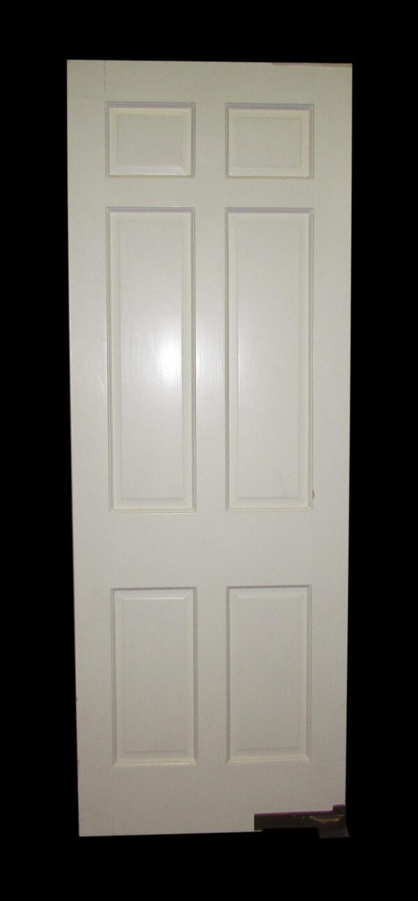 White wood swinging door with six raised panels shown front-facing.
