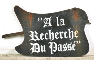 Vintage Signs - European French A La Recherche Du Passe Steel Commercial Sign