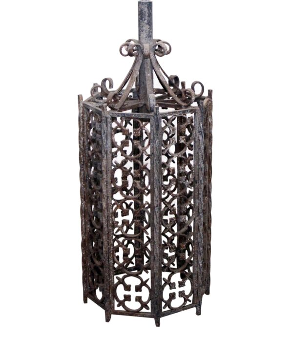 Exterior wrought iron ceiling lantern with an ornate cage-like frame and top loop detail.