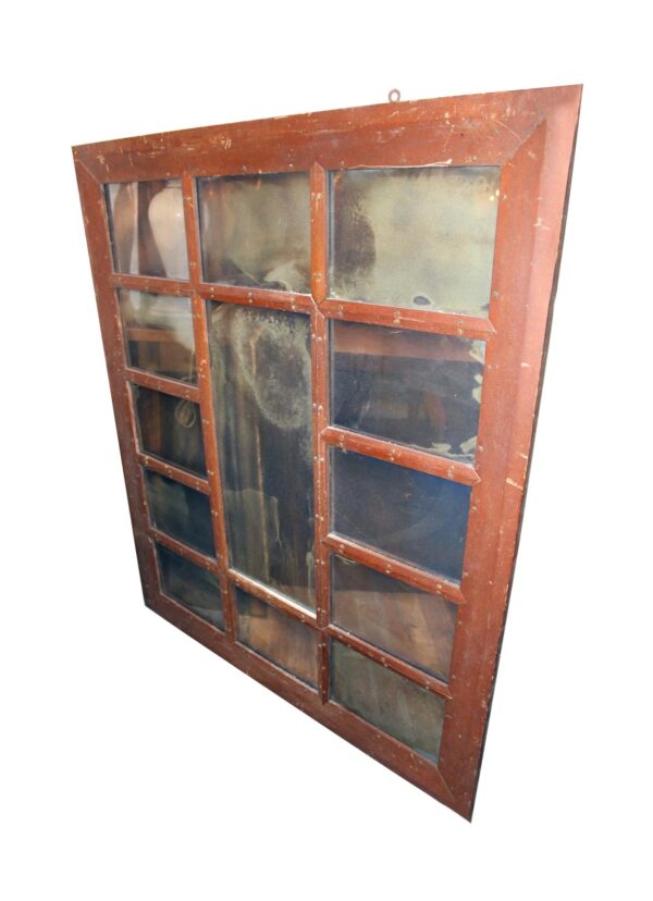 Rustic wooden window frame with multiple mirrored glass panes and a dark wood tone finish, shown at an angle.