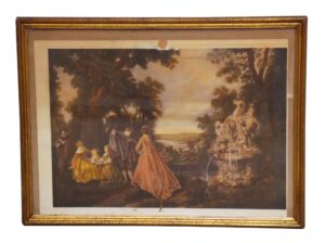 Matted Victorian scenic print in a gold gilt rectangular wooden frame, showing a landscape scene with figures and a fountain.