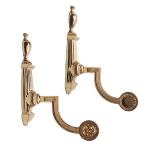 Pair of polished brass towel bar brackets shown as a matching pair, each with a traditional decorative arm and wall mount detail.
