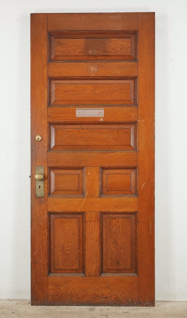 Entry Doors - Antique 7 Panel Chestnut Entry Door 83.75 x 35.625 in.