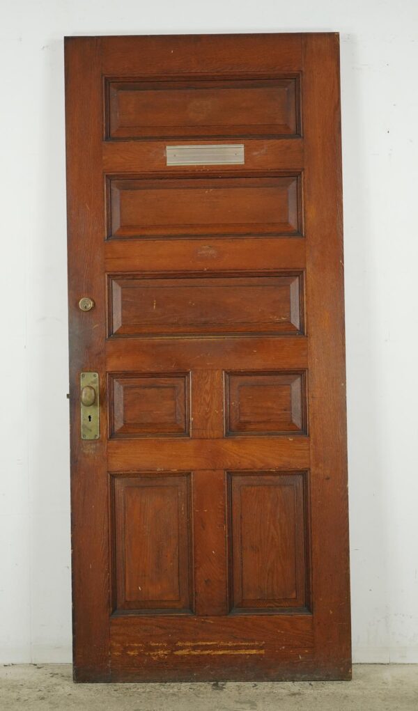 Entry Doors - Antique 7 Panel Chestnut Wood Entry Door 83.375 x 35.687 in.