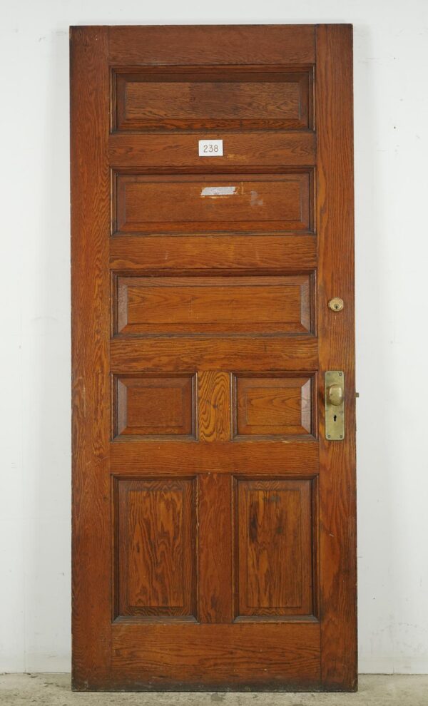 Entry Doors - Antique 7 Panel Chestnut Wood Entry Door 83.625 x 35.625 in.