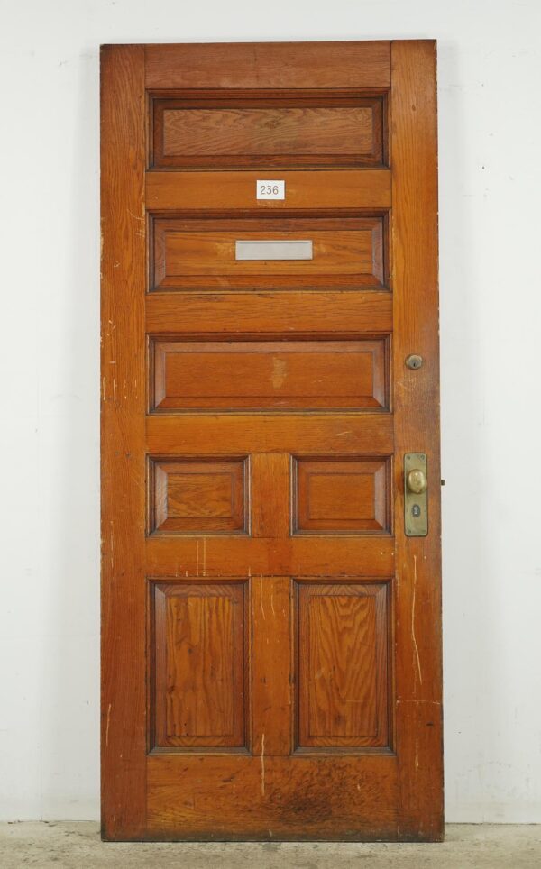 Entry Doors - Antique 7 Panel Chestnut Wood Entry Door 84 x 35.625 in.
