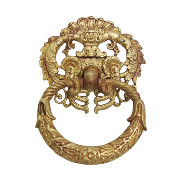 Ornate brass ring drawer pull with a Victorian-style backplate and floral detailing.