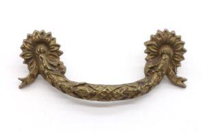 Pair of antique brass bridge drawer pulls with Victorian floral swag ends, shown as a matching pair.