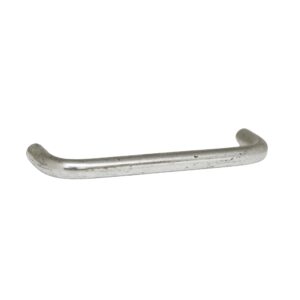 Chrome drawer pull with a curved bar and rounded ends, shown in a close-up side view with visible age wear.