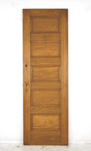 Vintage privacy door with five horizontal panels and an attached mortise lock, shown upright.