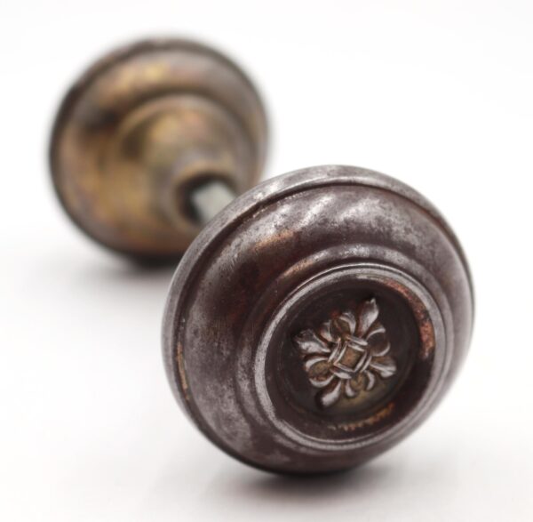 door-knobs-pair-of-vintage-fleur-de-lis-steel-passage-door-knobs-r289940