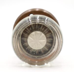 Round clear glass dummy door knob with an antique brass rosette, shown from the front.