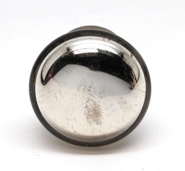 Round mercury glass door knob with a wide nickel shank, shown front view with visible surface wear.