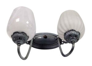Two-light wall sconce with two white glass shades and a dark central backplate, shown front on.
