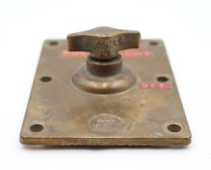 Brass ship light switch with a T-shaped knob and four mounting holes, stamped No. 1496.